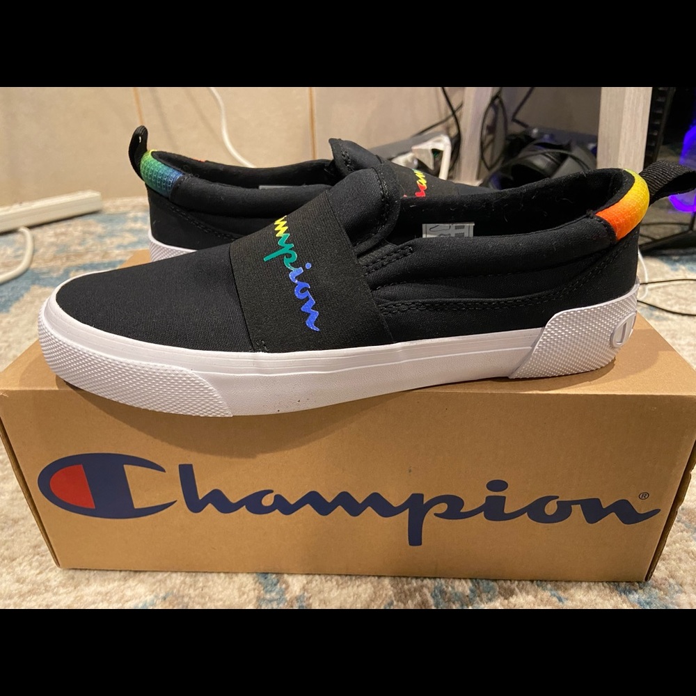 I am selling a pair of uworn champion slip ons.
